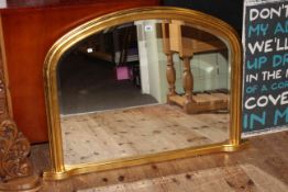 Gilt framed bevelled glass overmantel mirror.