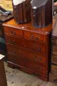 Neat mahogany finish four height chest on bracket feet, 76cm by 50cm.