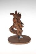 Tree root sculpture of natural twisting shape set on a wooden base, 30cm.
