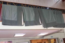 Two pairs of quality lined curtains with tie backs in green patterned fabric,