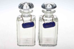 Pair spirit decanters with blue enamel labels for Brandy and Gin.