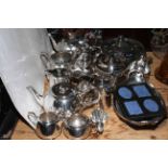 Collection of silver plate including teapots, tureen, picture frame.
