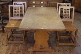 Sid Pollard oak adzed top refectory dining table and four lattice back dining chairs,