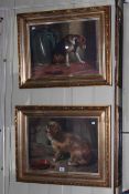 Pair of gilt framed prints of dogs.