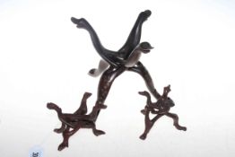 African carved and inlaid wood tribal tripod stand, together with two small stands (3).