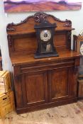 Small Victorian mahogany chiffonier with carved and panelled back.