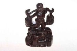 Chinese hardwood figure of boy with buckets.