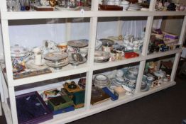 Two shelves of ceramics, commemorative, books, display case, football programmes, tins, etc.