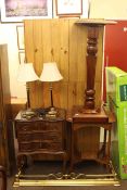 Walnut three drawer drop side chest, occasional table, mahogany torchere,