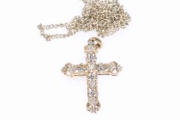 10k gold and diamond set cross with 9 carat gold chain.