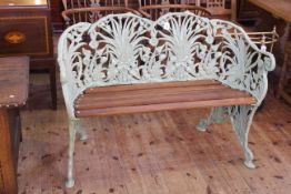 Coalbrookedale style cast metal garden bench with wooden slats, 82cm by 118cm.
