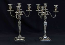 Pair of Victorian silver four branch candelabra,
