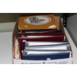 Box of covers, stamps and presentation packs including face value of approximately £120,