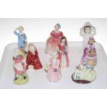 Collection of nine Royal Doulton figures.