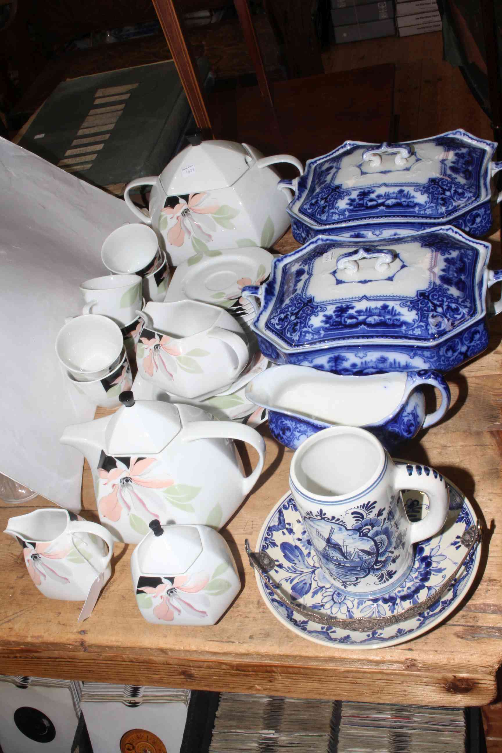 Scherzer Art Deco tea set with two blue and white tureens and others.
