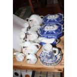 Scherzer Art Deco tea set with two blue and white tureens and others.