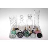 Crystal decanters, vases and coloured glass scent bottles and paperweights.