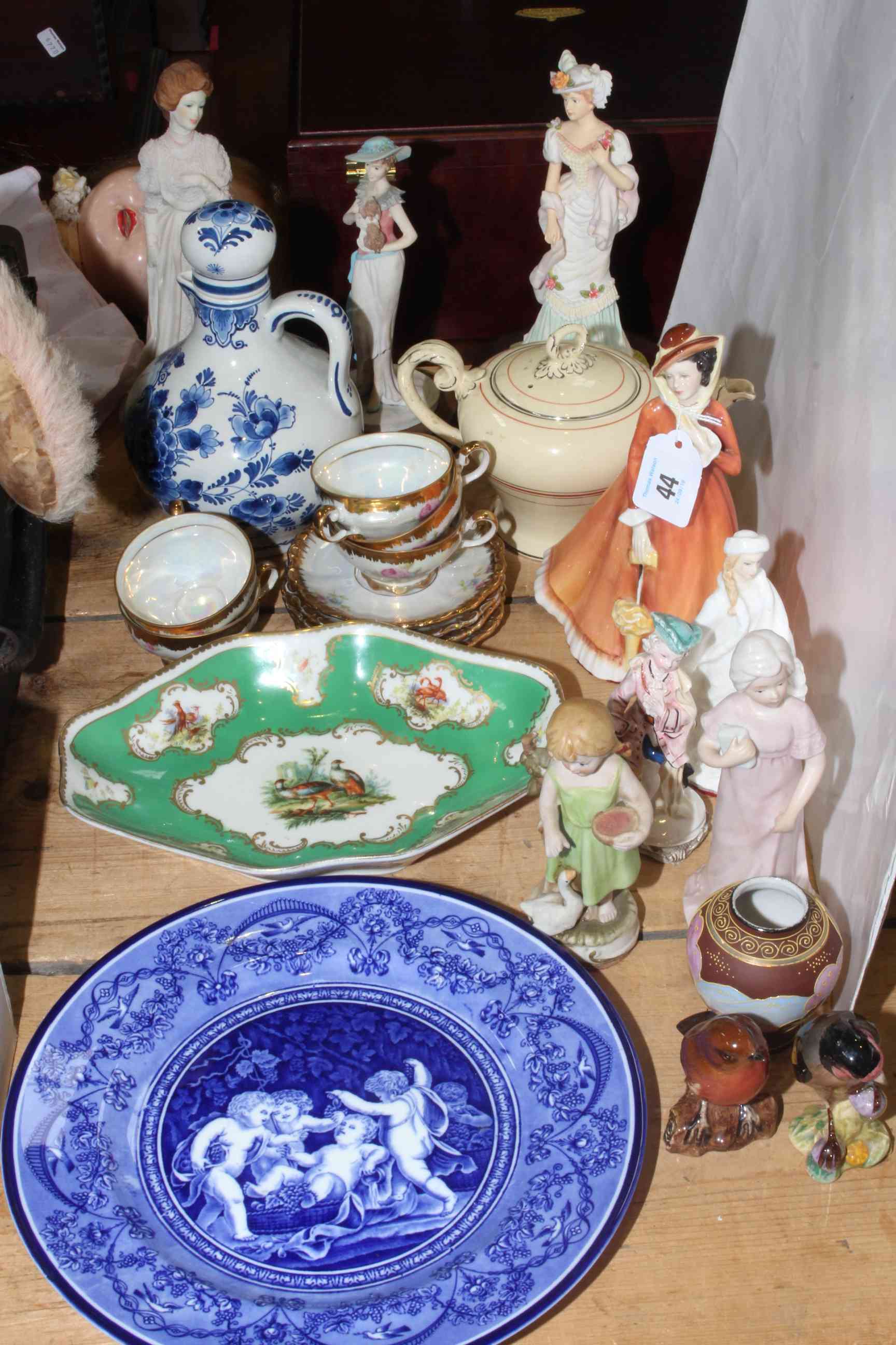 Collection of ceramics including Beswick birds, Royal Doulton ladies, Leonardo.