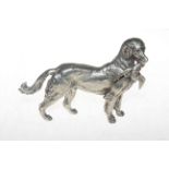 Silver plated Retriever with bird prey.