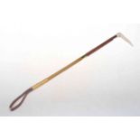 Ivory handled riding crop.