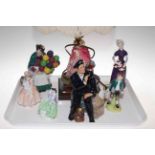 Collection of seven Royal Doulton figures and table lamp with shade.