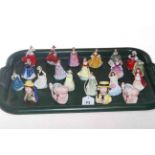 Collection of twenty miniature Royal Doulton and other lady figures and tobys.