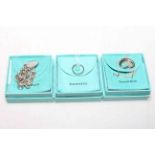 Three pieces of Tiffany silver jewellery, bracelet, heart pendant and ring,