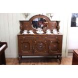 1920's/30's carved oak mirror back sideboard, 156cm by 138cm.