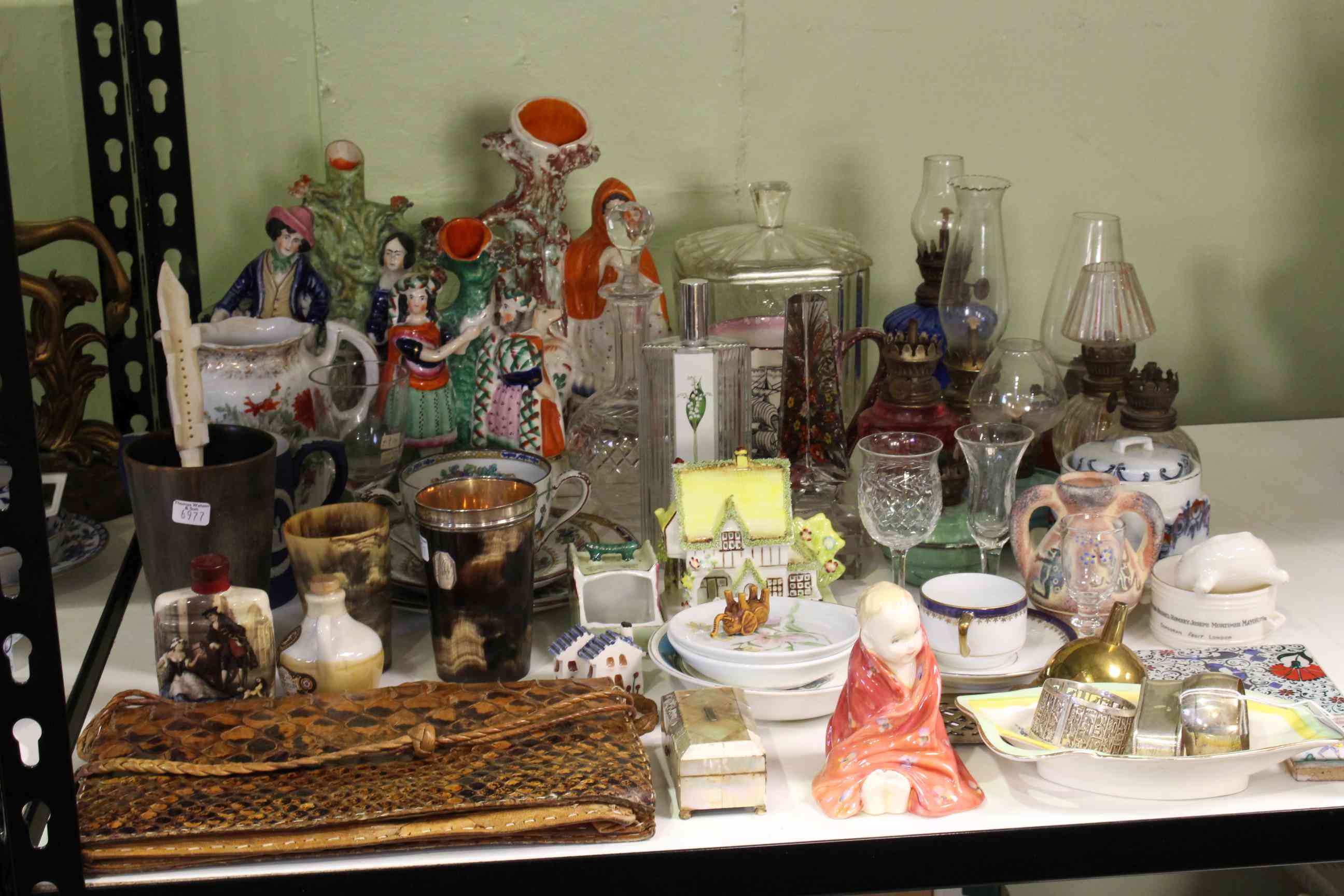 Collection of ceramics, glass, animal skin bag, horn beakers, Staffordshire spill vases.
