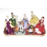 Seven Royal Doulton figurines including The Young Master, Happy Anniversary and The Last Waltz.
