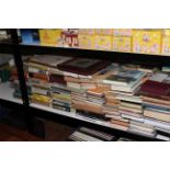 Shelf of books including Teesdale, Mountaineering, Cooking, BBC Radio.