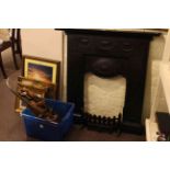 Cast iron fireplace and collection of hand tools including planes.