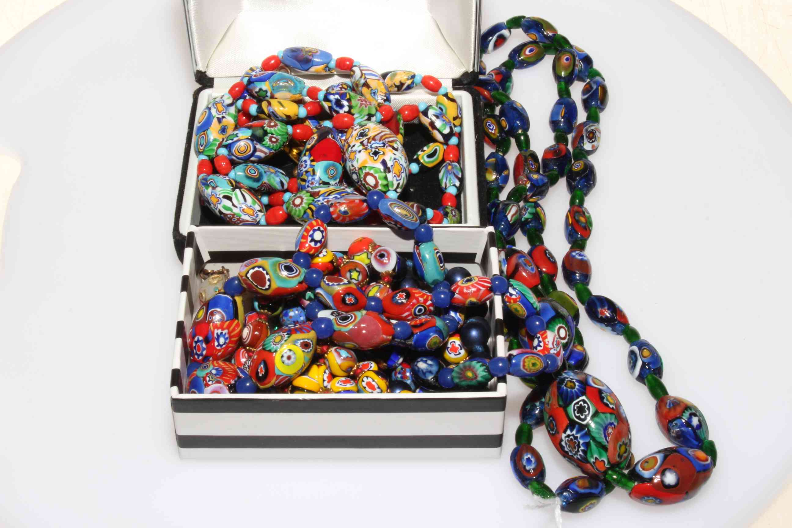 Four Millefiori glass necklaces, two other necklaces and cufflinks.