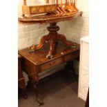 Mahogany and walnut two drawer sofa table and shaped top pedestal coffee table.