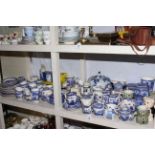 Blue and white pumpkin jar, large collection of Ringtons, two boxes of tins, etc.