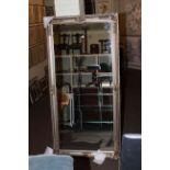 Large rectangular silvered framed bevelled wall mirror, 200cm by 100cm.