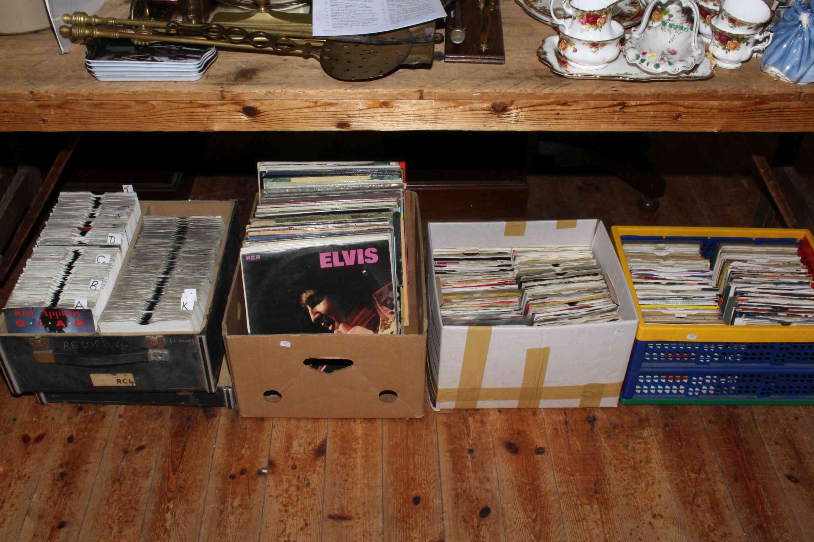 Four boxes of LP's and singles.