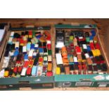 Two boxes of assorted model vehicles.