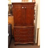 Mahogany serpentine front four drawer cocktail cabinet.