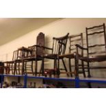 Carved oak armchair, splat back armchair, two rush seated chairs,