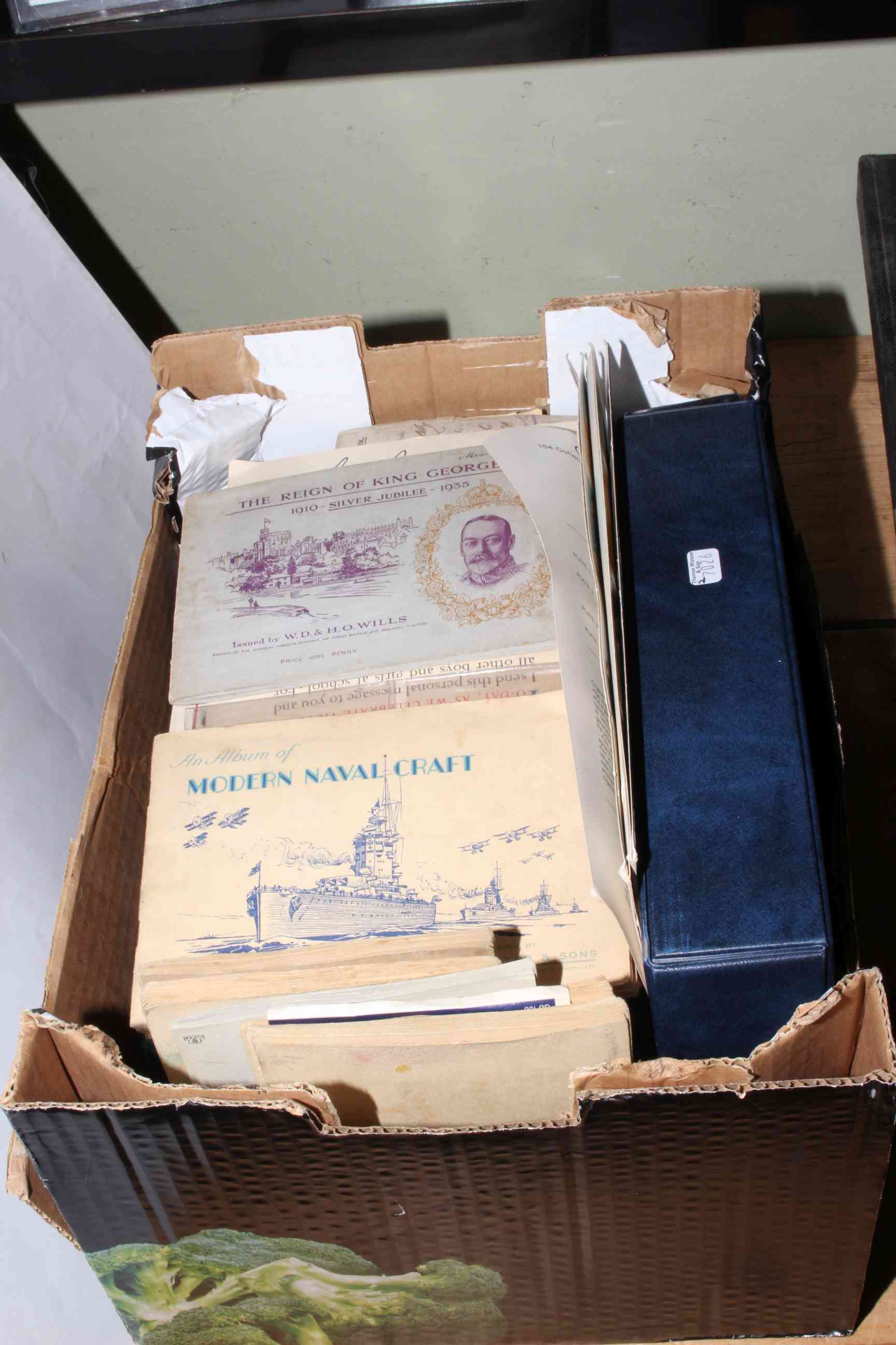 Two schoolboy stamp books including Siam, China, Mongolia, USA, Danzig, Bavaria,