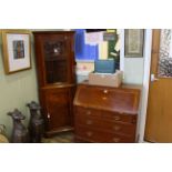 Mahogany and line inlaid glazed door standing corner cabinet and inlaid mahogany four drawer bureau.