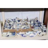 Collection of blue and white Delft pottery including clogs, figures, etc.