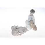 Two Lladro figures, Pig with Piglets and Boy with Dog.