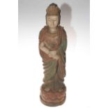 Large Chinese carved wood Guanyin figure, having coloured features, 59cm.