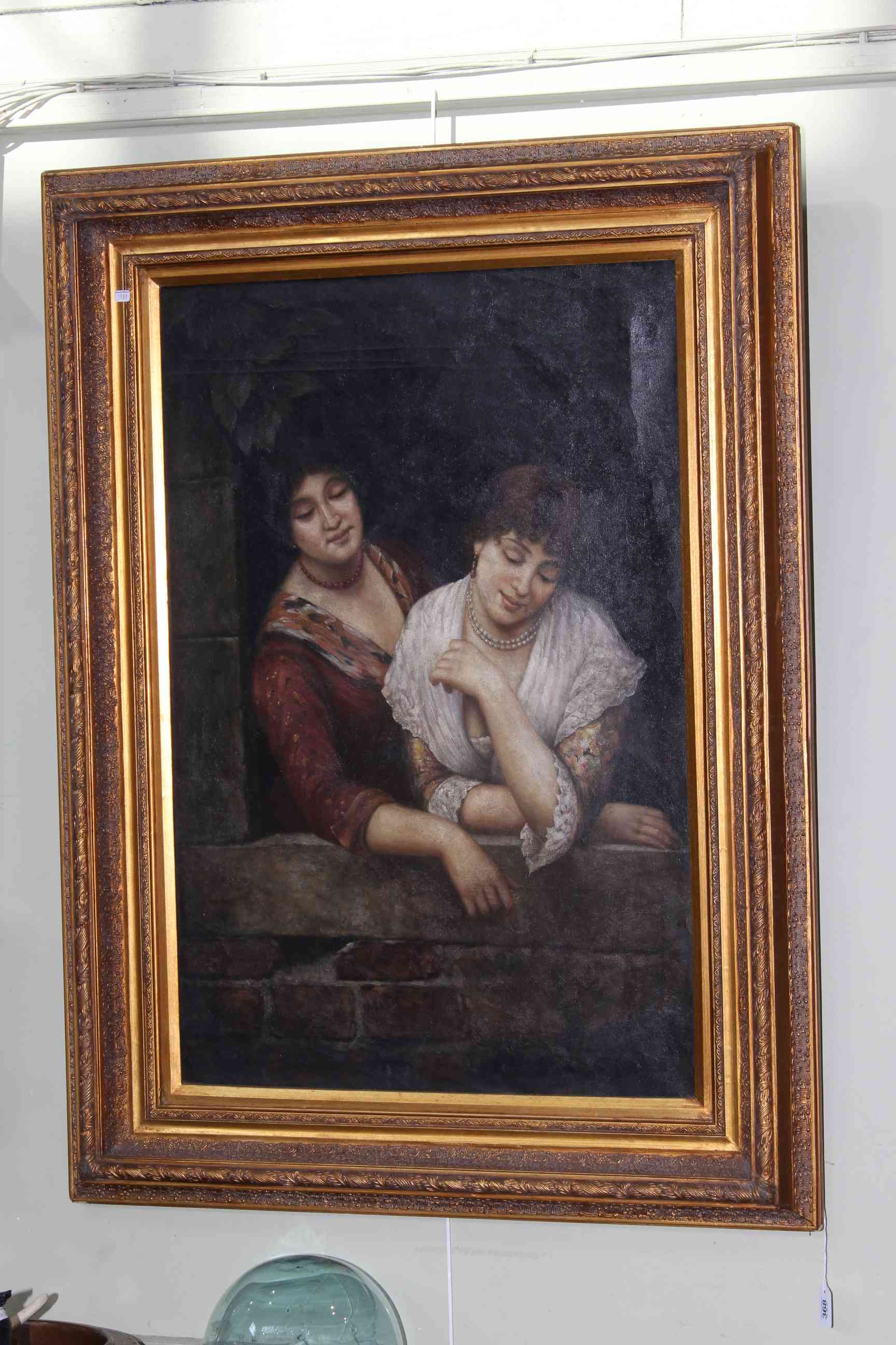 Large gilt framed oil on canvas of two ladies, 90cm by 59cm.