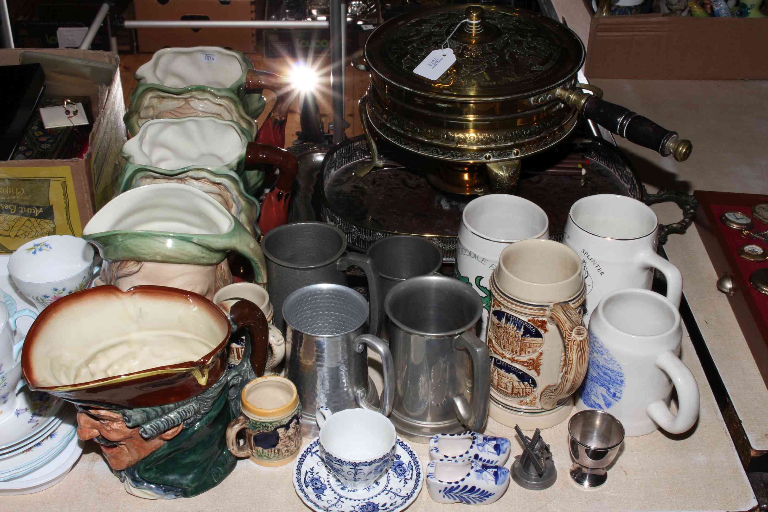 Brass fondue, silver plated trays, four toby jugs, steins, etc.