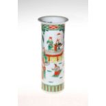 Chinese porcelain famille verte cylindrical vase decorated with figures paying homage,
