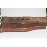 Leather Shoulder of Mutton gun case and canvas gun case.