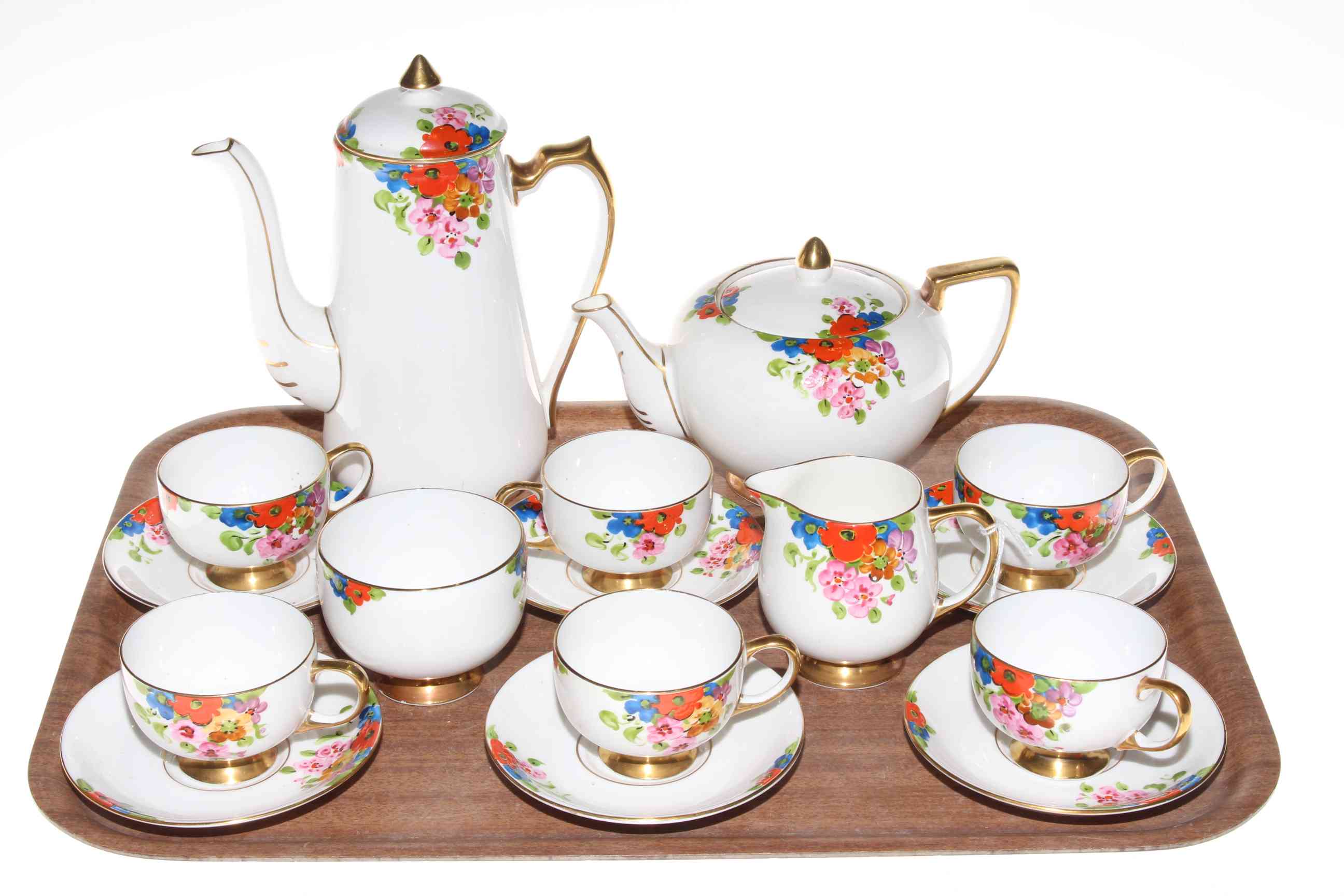1930's sixteen piece Carlton china tea set with floral design.